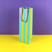 Ava & Yves Geschenktüte Stripes Flasche Grasgruen-Mint-Flieder